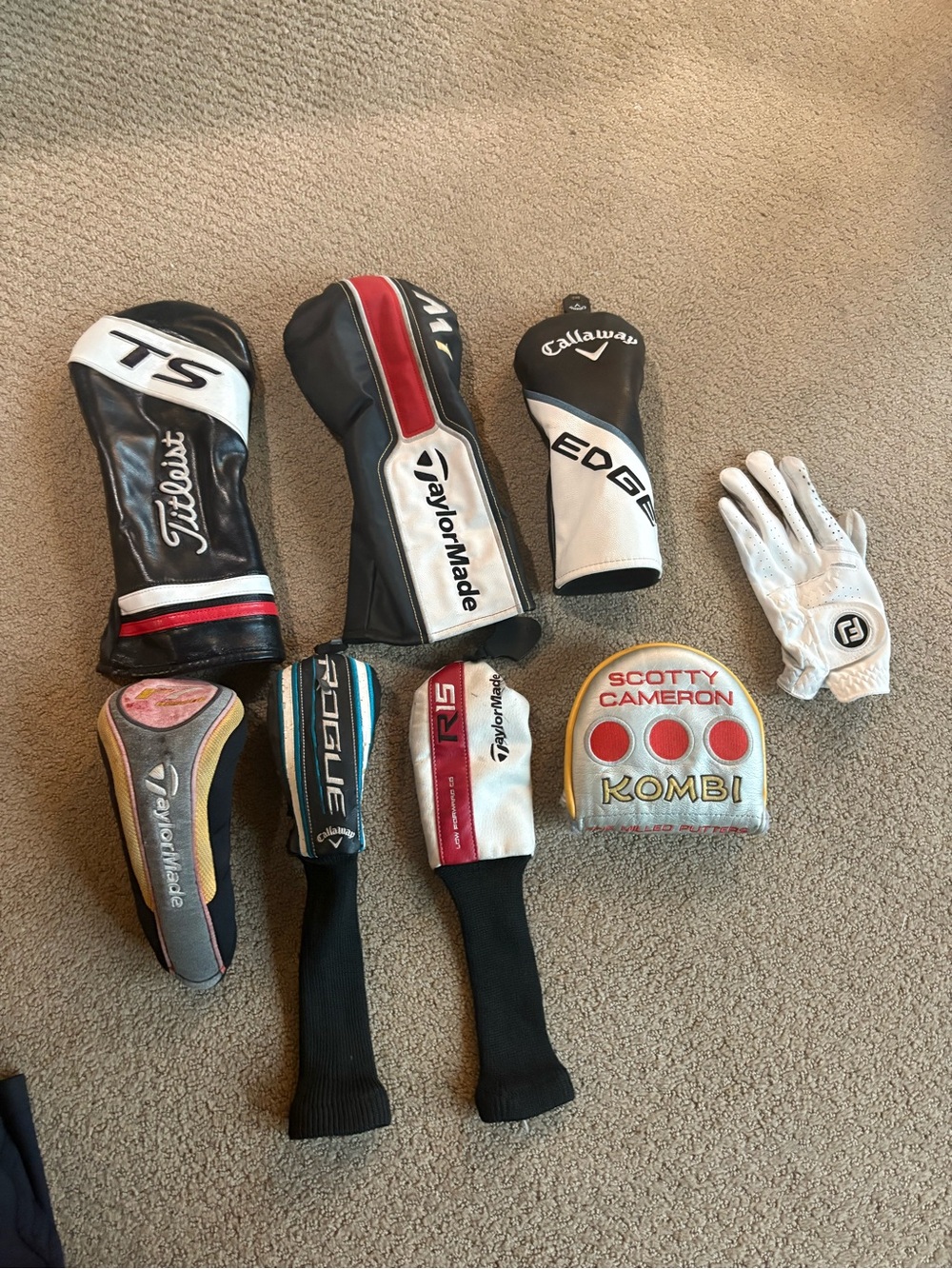 Scotty Cameron headcover, taylormade, callaway, and footjoy glove.